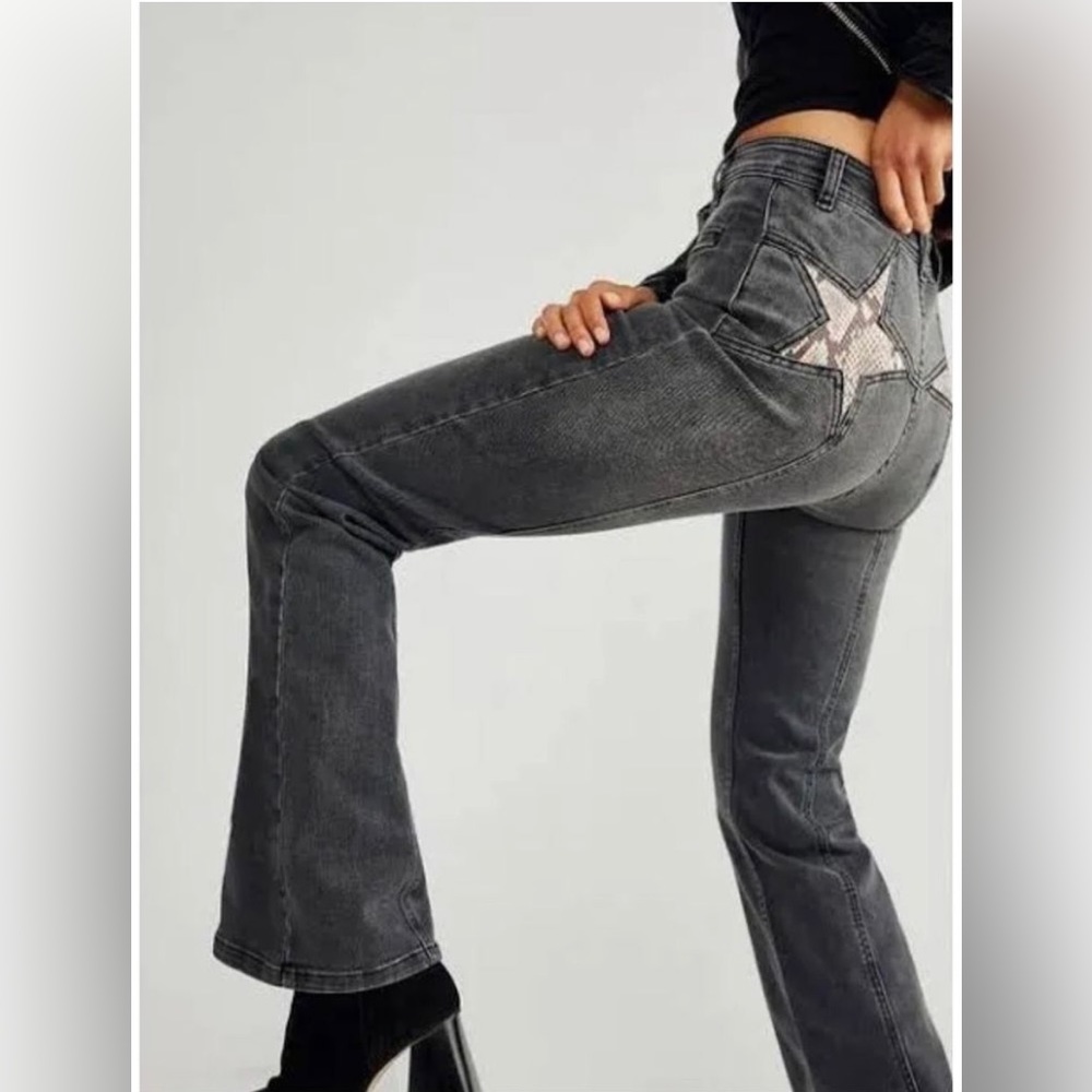 Free People black denim star snakeskin flare jeans
